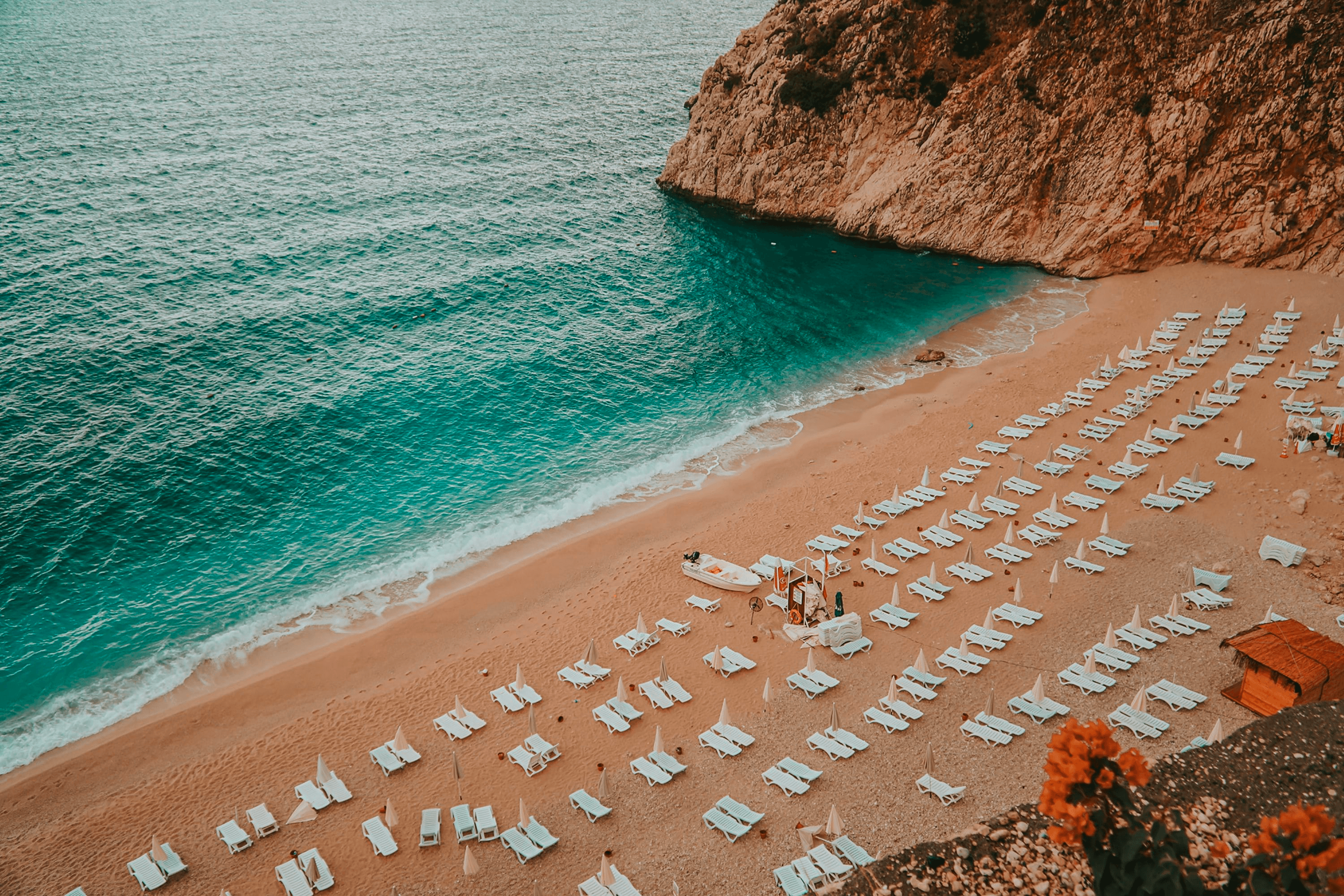 Empty beach with the sunbeds in Kaputaş beach